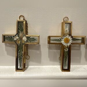 Pressed flowers in cross gallery frame